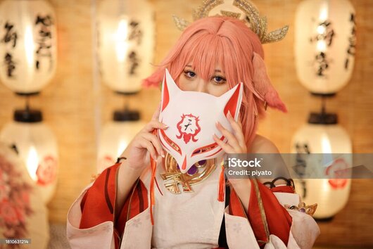 pink haired woman, dressed in historical japanese cosplay holding a mask